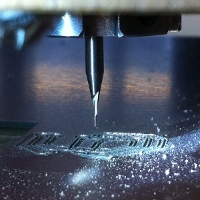 A view of the bit doing the isolation routing on the blackToe cnc router