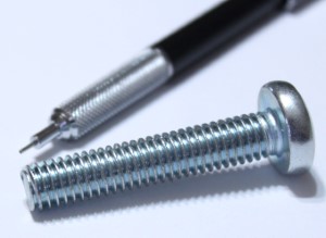 3/8 inch x 2 inch screw shown with mechanical pencil for scale 