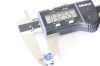 LED button shown with a caliper. The measurement reads .3255 inches. 