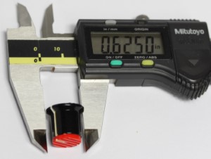 Black and red potentiometer cap. Height Measurement.