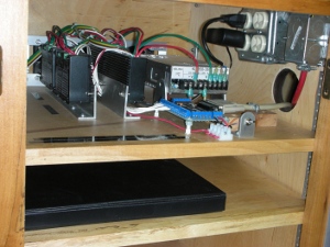 The electronics in a shelf inside the cabinet where power is also considered on Walter's blackToe cnc machine