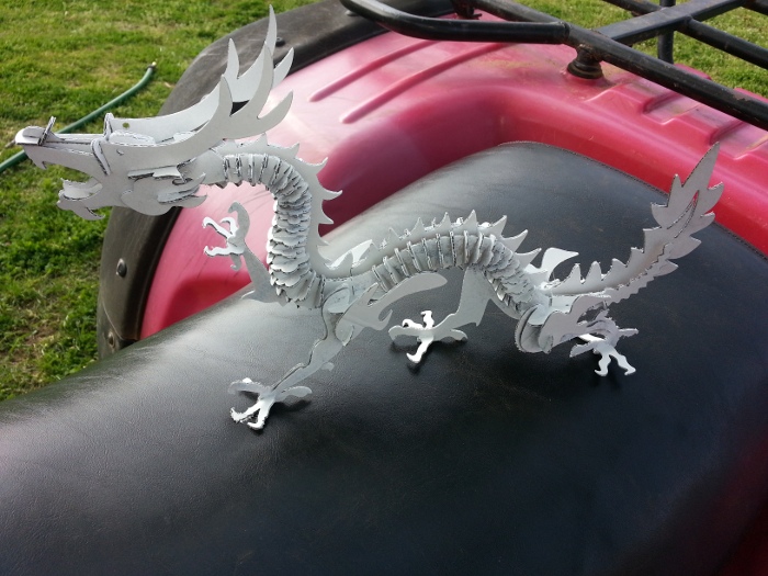 blackTooth Laser Cutter example of a 3d dragon puzzle