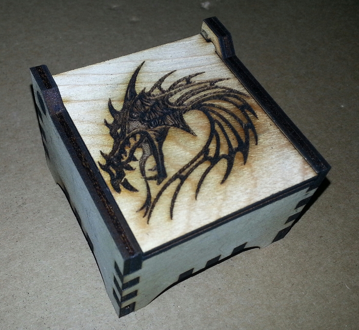blackTooth Laser Cutter Example of box with dragon outline engraved