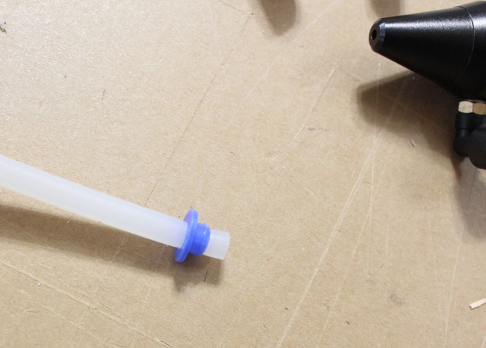 Install the small silicone tube to the nozzle