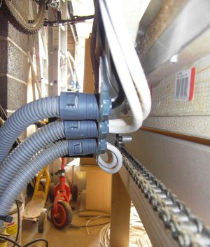 The wire conduit connection on the gantry side of Ronald L's blackToe v2.1 cnc router
